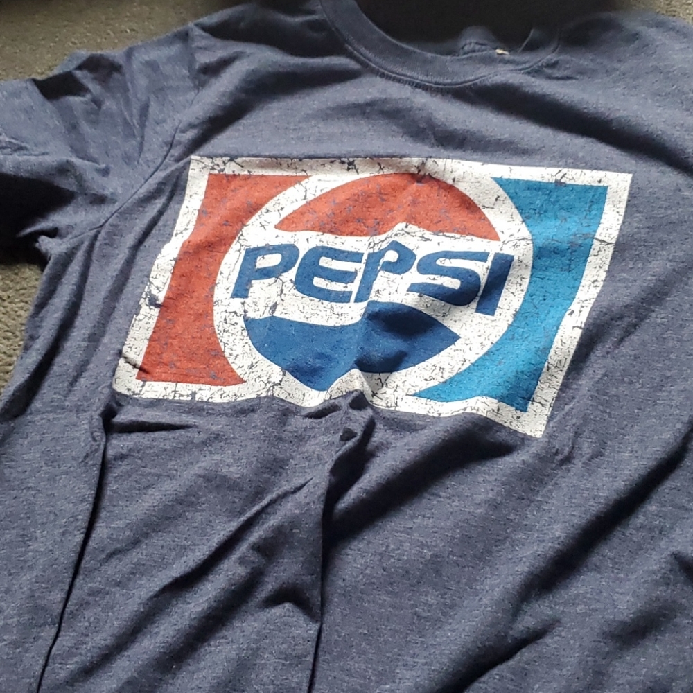 A blue Pepsi shirt